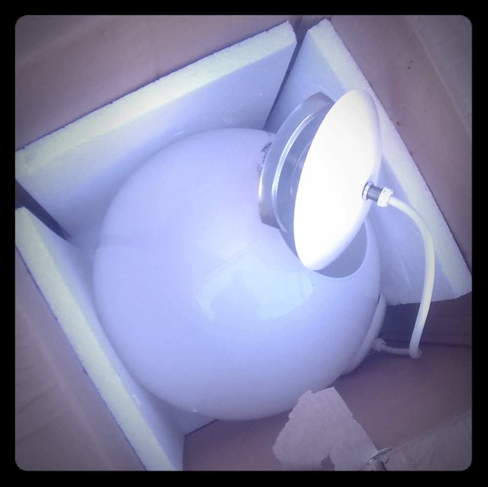 Ceiling hardwired hanging lights have three of the